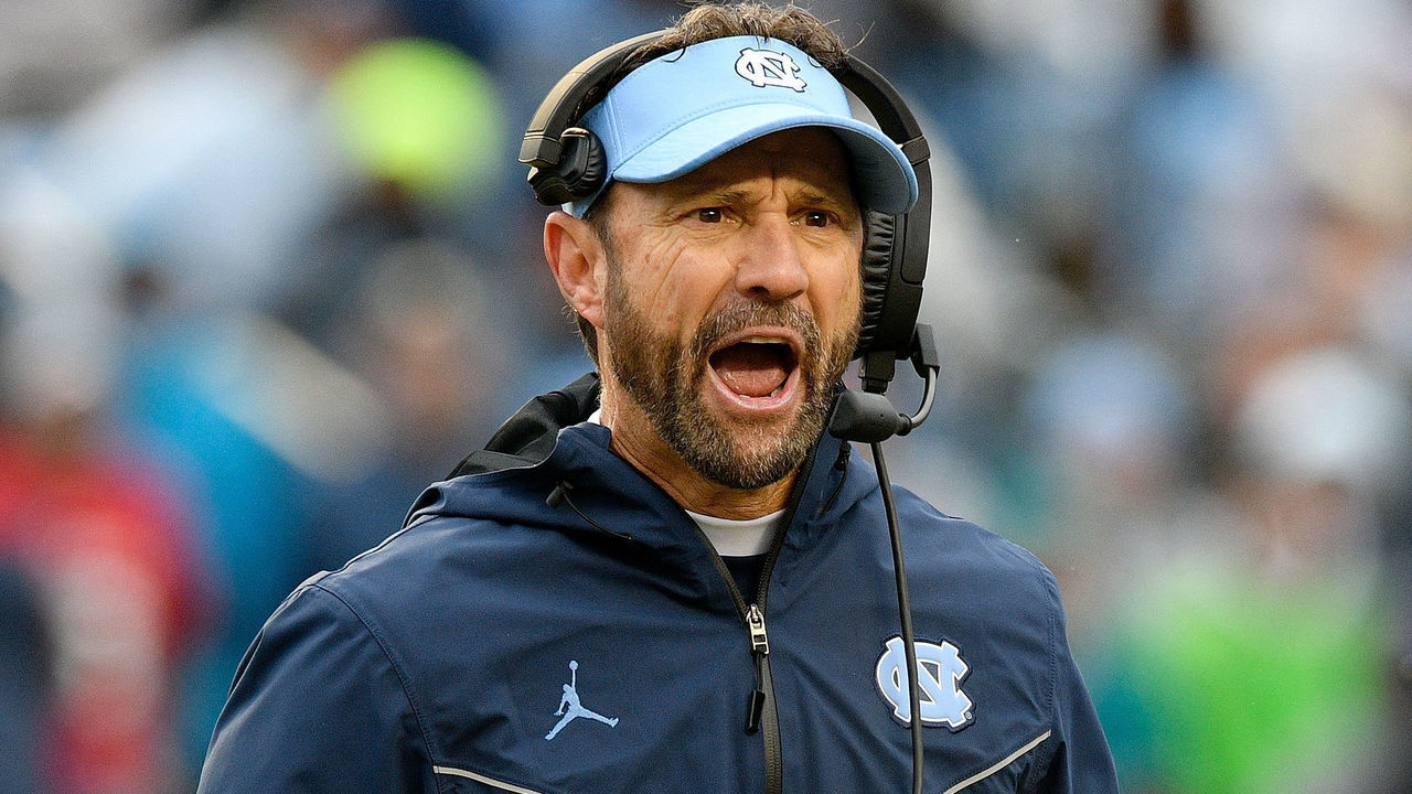 CHAPEL HILL, NORTH CAROLINA - NOVEMBER 24: Head coach Larry Fedora of the North Carolina Tar Heels questions a call by the officials during the second half of their game against the North Carolina State Wolfpack at Kenan Stadium on November 24, 2018 in Chapel Hill, North Carolina. North Carolina State won 34-28 in overtime.