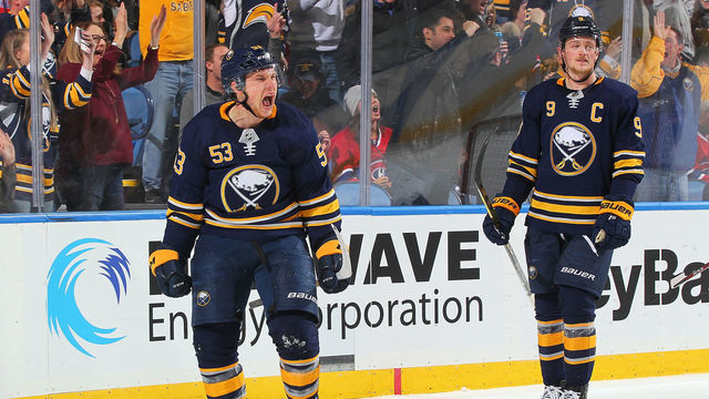 BUFFALO, NY - NOVEMBER 23: Jeff Skinner #53 celebrates his third period goal with Jack Eichel #9 of the Buffalo Sabres during an NHL game against the Montreal Canadiens on November 23, 2018 at KeyBank Center in Buffalo, New York.