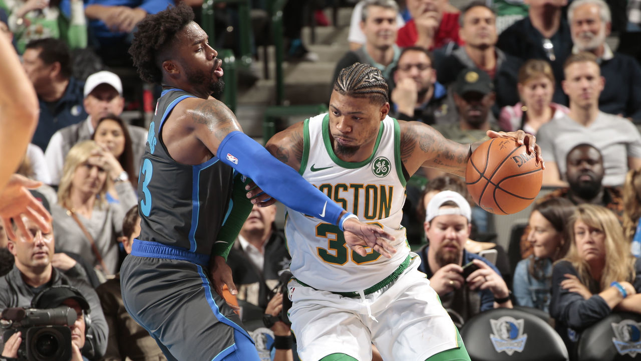 DALLAS, TX - NOVEMBER 24: Marcus Smart #36 of the Boston Celtics handles the ball against the Dallas Mavericks on November 24, 2018 at the American Airlines Center in Dallas, Texas. Mandatory Copyright Notice: Copyright 2018 NBAE