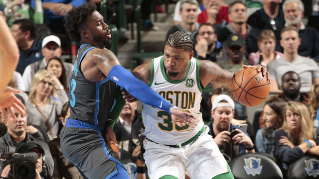 DALLAS, TX - NOVEMBER 24: Marcus Smart #36 of the Boston Celtics handles the ball against the Dallas Mavericks on November 24, 2018 at the American Airlines Center in Dallas, Texas. Mandatory Copyright Notice: Copyright 2018 NBAE