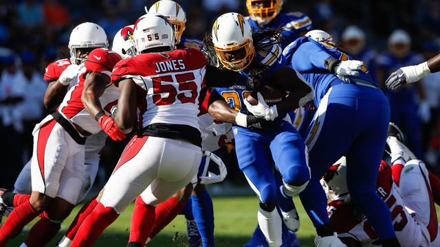 CARSON, CA - NOVEMBER 25: Running back Melvin Gordon #28 of the Los Angeles Chargers makes a short run in the first quarter against the Arizona Cardinals at StubHub Center on November 25, 2018 in Carson, California.