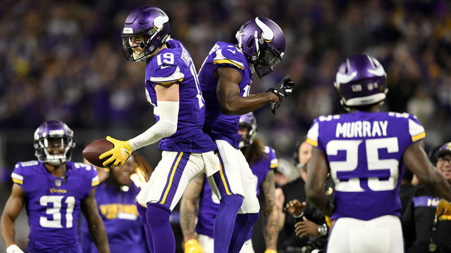 MINNEAPOLIS, MN - NOVEMBER 25: Adam Thielen #19 of the Minnesota Vikings celebrates after a 14 yard touchdown reception in the third quarter of the game against the Green Bay Packers at U.S. Bank Stadium on November 25, 2018 in Minneapolis, Minnesota.