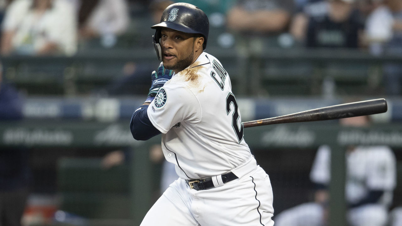 SEATTLE, WA - SEPTEMBER 5: Robinson Cano #22 of the Seattle Mariners takes a swing during an at-bat in a game against the Baltimore Orioles at Safeco Field on September 5, 2018 in Seattle, Washington. The Mariners game 5-2.
