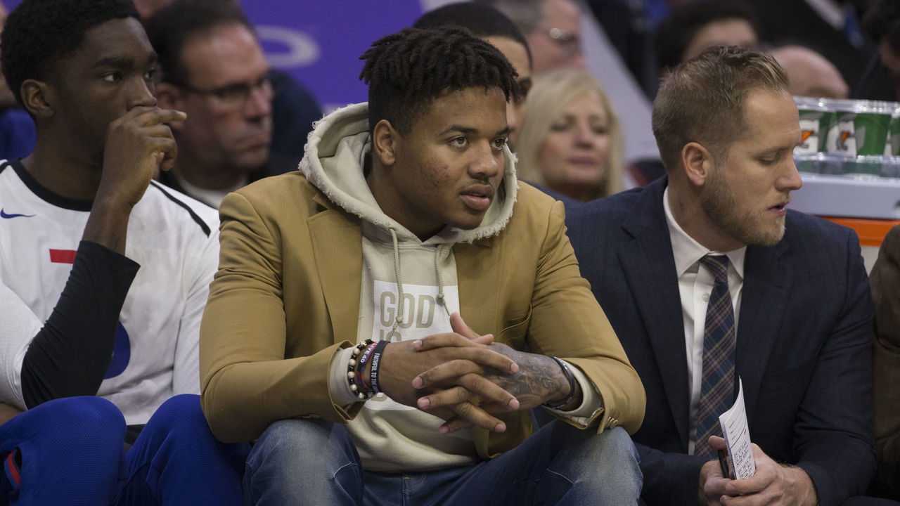 PHILADELPHIA, PA - NOVEMBER 23: Markelle Fultz #20 of the Philadelphia 76ers watches the game from the bench against the Cleveland Cavaliers at the Wells Fargo Center on November 23, 2018 in Philadelphia, Pennsylvania.