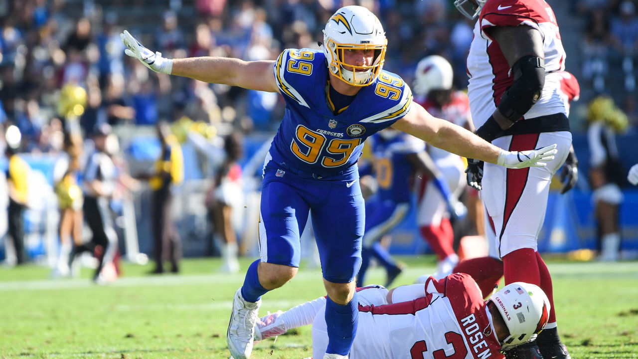 CARSON, CA - NOVEMBER 25: Defensive end Joey Bosa #99 of the Los Angeles Chargers celebrates his sack of quarterback Josh Rosen #3 of the Arizona Cardinals in the second quarter at StubHub Center on November 25, 2018 in Carson, California.
