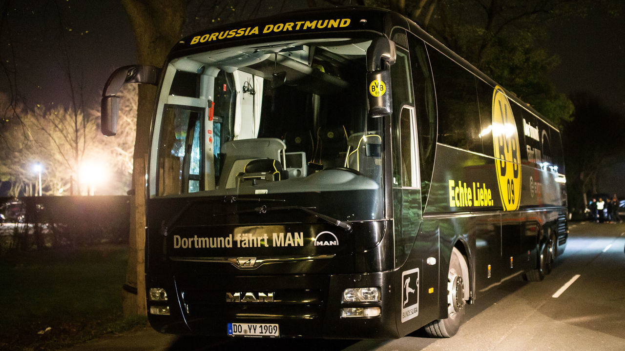 DORTMUND, GERMANY - APRIL 12: Team bus of the Borussia Dortmund football club damaged in an explosion is seen on April 12, 2017 in Dortmund, Germany. According to police an explosion detonated as the bus was leaving the hotel where the team was staying to bring them to their Champions League game against Monaco. So far one person, team member Marc Bartra, is reported injured.