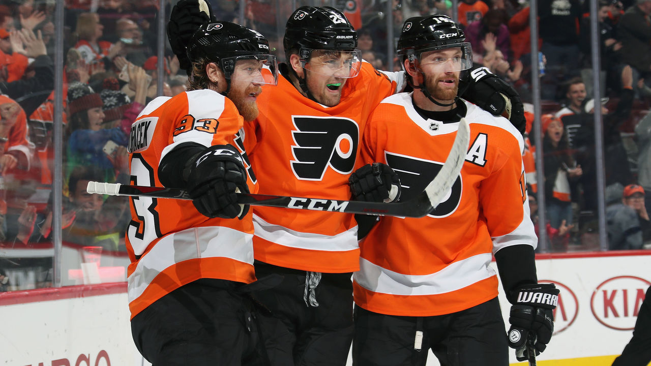 PHILADELPHIA, PA - NOVEMBER 17: James van Riemsdyk #25 of the Philadelphia Flyers celebrates his second period power-play goal against the Tampa Bay Lightning with Jakub Voracek #93 and Sean Couturier #14 on November 17, 2018 at the Wells Fargo Center in Philadelphia, Pennsylvania. Claude Giroux #28(not pictured) earned an assist on the play, which was the 700th point in his NHL career.