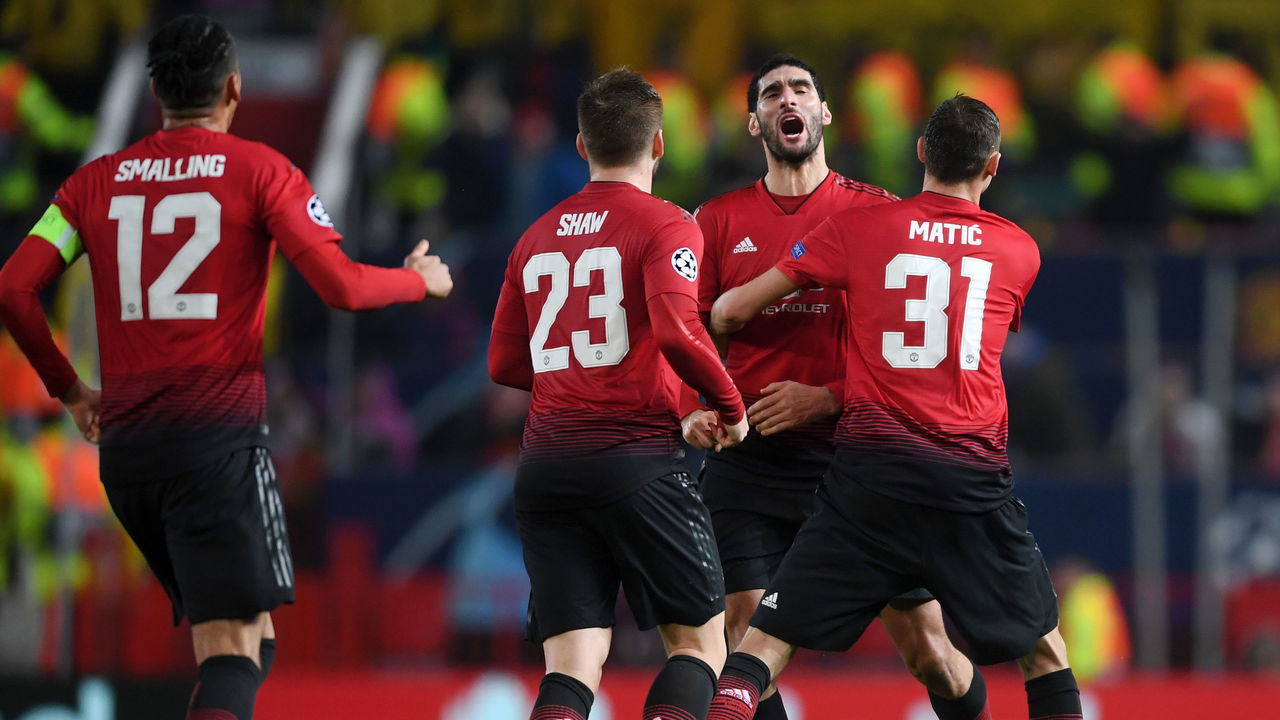 MANCHESTER, ENGLAND - NOVEMBER 27: Marouane Fellaini of Manchester United (2R) celebrates after scoring his team's first goal with team mates during the UEFA Champions League Group H match between Manchester United and BSC Young Boys at Old Trafford on November 27, 2018 in Manchester, United Kingdom.