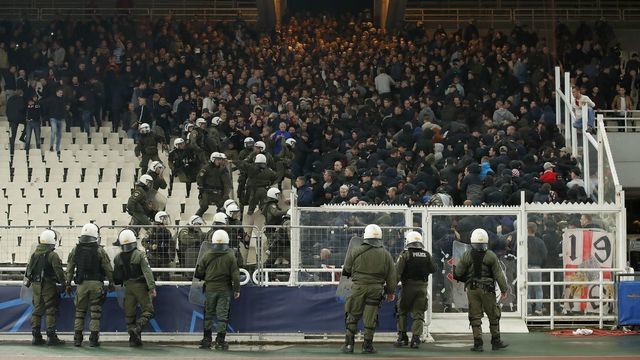 Greece police with Ajax fans during the UEFA Champions League group E match between AEK FC and Ajax Amsterdam at the OAKA Spyros Louis on November 27, 2018 in Athens, Greece