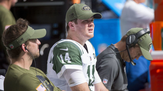 MIAMI GARDENS, FL - NOVEMBER 04: New York Jets Quarterback Sam Darnold (14) sits on the bench on the sidelines during the NFL football game between the New York Jets and the Miami Dolphins on November 4, 2018 at the Hard Rock Stadium in Miami Gardens, FL.