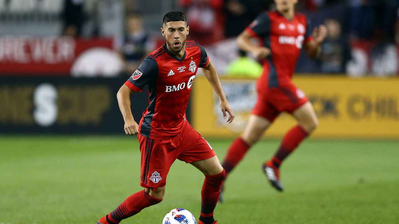 TORONTO, ON - SEPTEMBER 19: Jonathan Osorio #21 of Toronto FC dribbles the ball during the first half of the 2018 Campeones Cup Final against Tigres UANL at BMO Field on September 19, 2018 in Toronto, Canada.