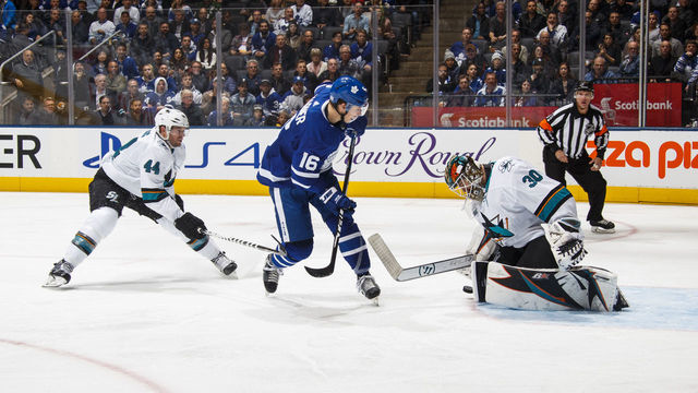 TORONTO, ON - NOVEMBER 28: Mitch Marner #16 of the Toronto Maple Leafs shoots against Aaron Dell #30 of the San Jose Sharks during the third period at the Scotiabank Arena on November 28, 2018 in Toronto, Ontario, Canada.