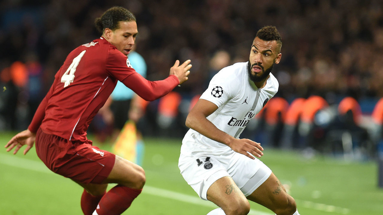PARIS, FRANCE - NOVEMBER 28: Eric-Maxim Choupo-Moting of Paris Saint-Germain is challenged by Virgil Van Dijk of Liverpool during the Group C match of the UEFA Champions League between Paris Saint-Germain and Liverpool at Parc des Princes on November 28, 2018 in Paris, France.