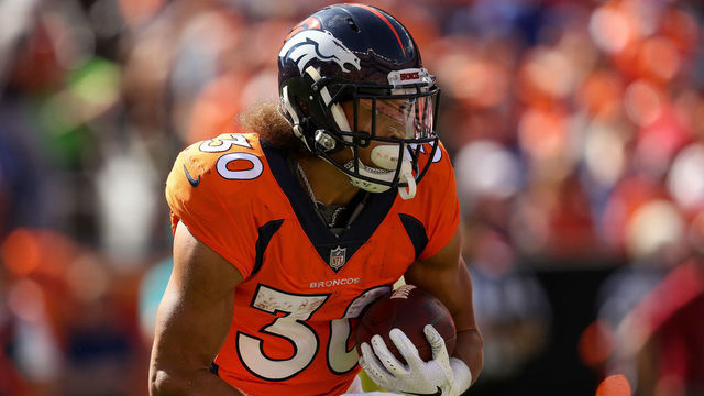 DENVER, CO - SEPTEMBER 16: Running back Phillip Lindsay #30 of the Denver Broncos carries the ball against the Oakland Raiders in the first quarter of a game at Broncos Stadium at Mile High on September 16, 2018 in Denver, Colorado.