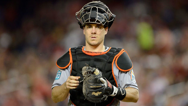 WASHINGTON, DC - AUGUST 17: J.T. Realmuto #11 of the Miami Marlins catches against the Washington Nationals at Nationals Park on August 17, 2018 in Washington, DC.