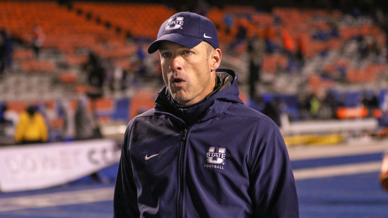 BOISE, ID - NOVEMBER 24: Head Coach Matt Wells of the Utah State Aggies walks off the field at the conclusion of second half action against the Boise State Broncos on November 24, 2018 at Albertsons Stadium in Boise, Idaho. Boise State won the game 33-24.