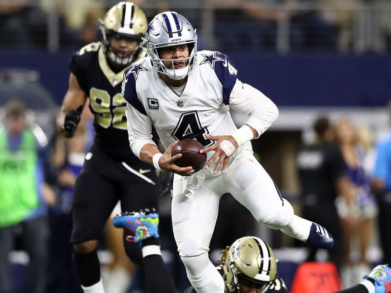 Cowboys stun Saints 13-10 for 4th straight win