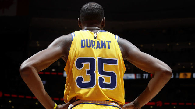 TORONTO, CANADA - NOVEMBER 29: Kevin Durant #35 of the Golden State Warriors looks on during the game against the Toronto Raptors on November 29, 2018 at Scotiabank Arena in Toronto, Ontario, Canada. NOTE TO USER: User expressly acknowledges and agrees that, by downloading and/or using this photograph, user is consenting to the terms and conditions of the Getty Images License Agreement. Mandatory Copyright Notice: Copyright 2018 NBAE