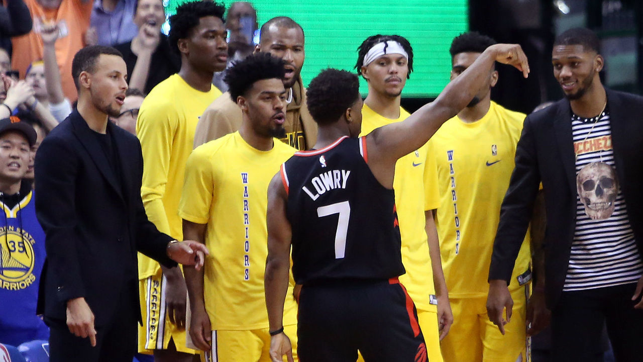 TORONTO, ON - NOVEMBER 29: Kyle Lowry #7 of the Toronto Raptors teases the Golden State Warriors bench after sinking a 3 pointer during the second half of an NBA game at Scotiabank Arena on November 29, 2018 in Toronto, Canada.