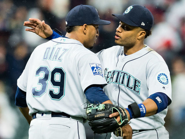 CLEVELAND, OH - APRIL 28: Closing pitcher Edwin Diaz #39 celebrates with Robinson Cano #22 of the Seattle Mariners after the Mariners defeated the Cleveland Indians at Progressive Field on April 28, 2017 in Cleveland, Ohio. The Mariners defeated the Indians 3-1.
