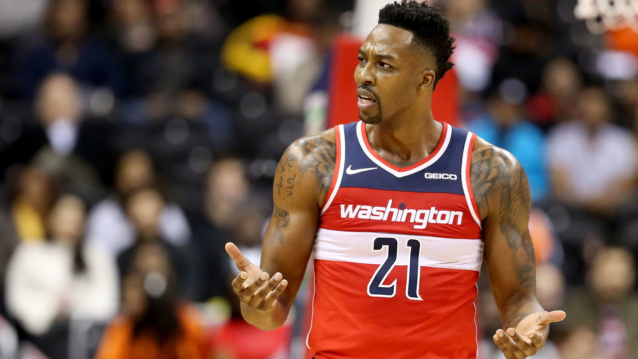 WASHINGTON, DC - NOVEMBER 14: Dwight Howard #21 of the Washington Wizards reacts after a play against the Cleveland Cavaliers during the first half at Capital One Arena on November 14, 2018 in Washington, DC.