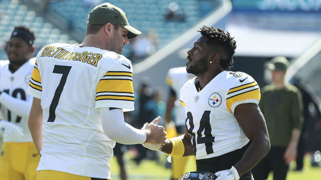 JACKSONVILLE, FL - NOVEMBER 18: Ben Roethlisberger #7 of the Pittsburgh Steelers and Antonio Brown #84 of the Pittsburgh Steelers embrace before the game between between the Jacksonville Jaguars and the Pittsburgh Steelers at TIAA Bank Field on November 18, 2018 in Jacksonville, Florida.