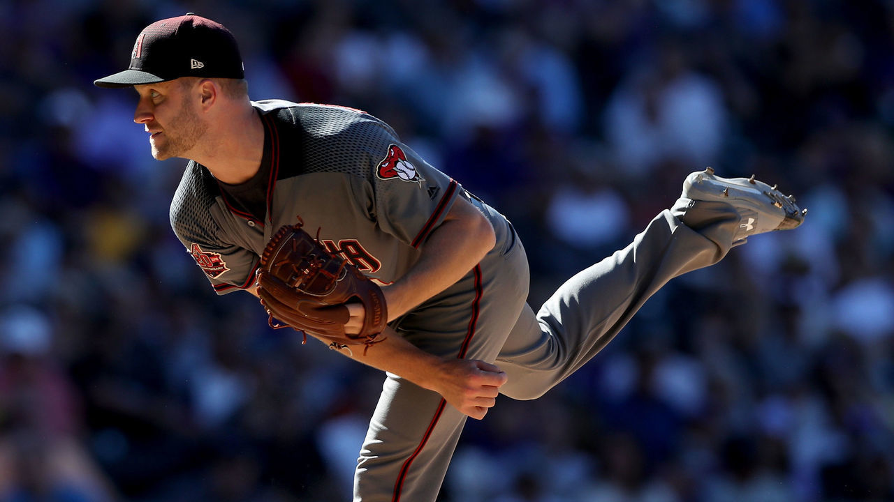 DENVER, CO - SEPTEMBER 13: Pitcher Brad Boxberger #31 of the Arizona Diamondbacks throws in the seventh inning against the Colorado Rockies at Coors Field on September 13, 2018 in Denver, Colorado.