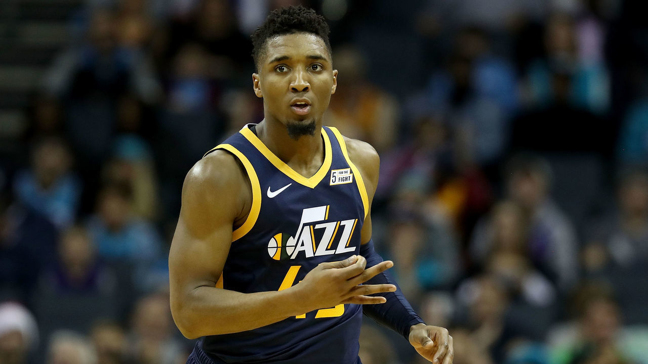 CHARLOTTE, NC - NOVEMBER 30: Donovan Mitchell #45 of the Utah Jazz reacts after a play against the Charlotte Hornets during their game at Spectrum Center on November 30, 2018 in Charlotte, North Carolina.