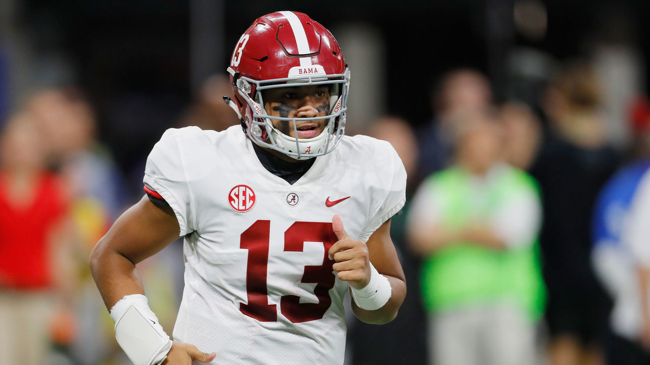 ATLANTA, GA - DECEMBER 01: Tua Tagovailoa #13 of the Alabama Crimson Tide reacts in the first half against the Georgia Bulldogs during the 2018 SEC Championship Game at Mercedes-Benz Stadium on December 1, 2018 in Atlanta, Georgia.