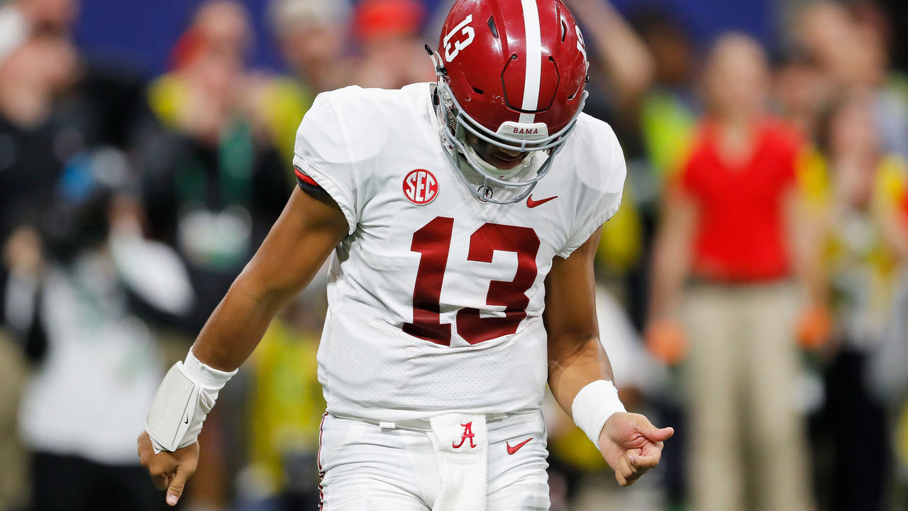 ATLANTA, GA - DECEMBER 01: Tua Tagovailoa #13 of the Alabama Crimson Tide reacts in the first half against the Georgia Bulldogs during the 2018 SEC Championship Game at Mercedes-Benz Stadium on December 1, 2018 in Atlanta, Georgia.