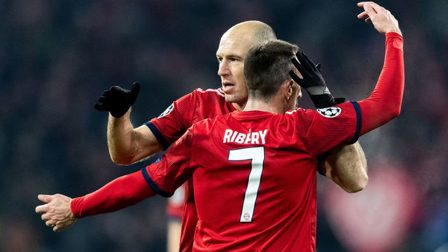 MUNICH, GERMANY - NOVEMBER 27: Arjen Robben of FC Bayern Muenchen celebrates with Franck Ribery of FC Bayern Muenchen after scoring his team's second goal during the Group E match of the UEFA Champions League between FC Bayern Muenchen and SL Benfica at Allianz Arena on November 27, 2018 in Munich, Germany.