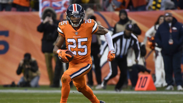 DENVER, CO - NOVEMBER 25: Chris Harris (25) of the Denver Broncos with the ball after an interception during the third quarter against the Pittsburgh Steelers. The Denver Broncos hosted the Pittsburgh Steelers at Broncos Stadium at Mile High in Denver, Colorado on Sunday, November 25, 2018.