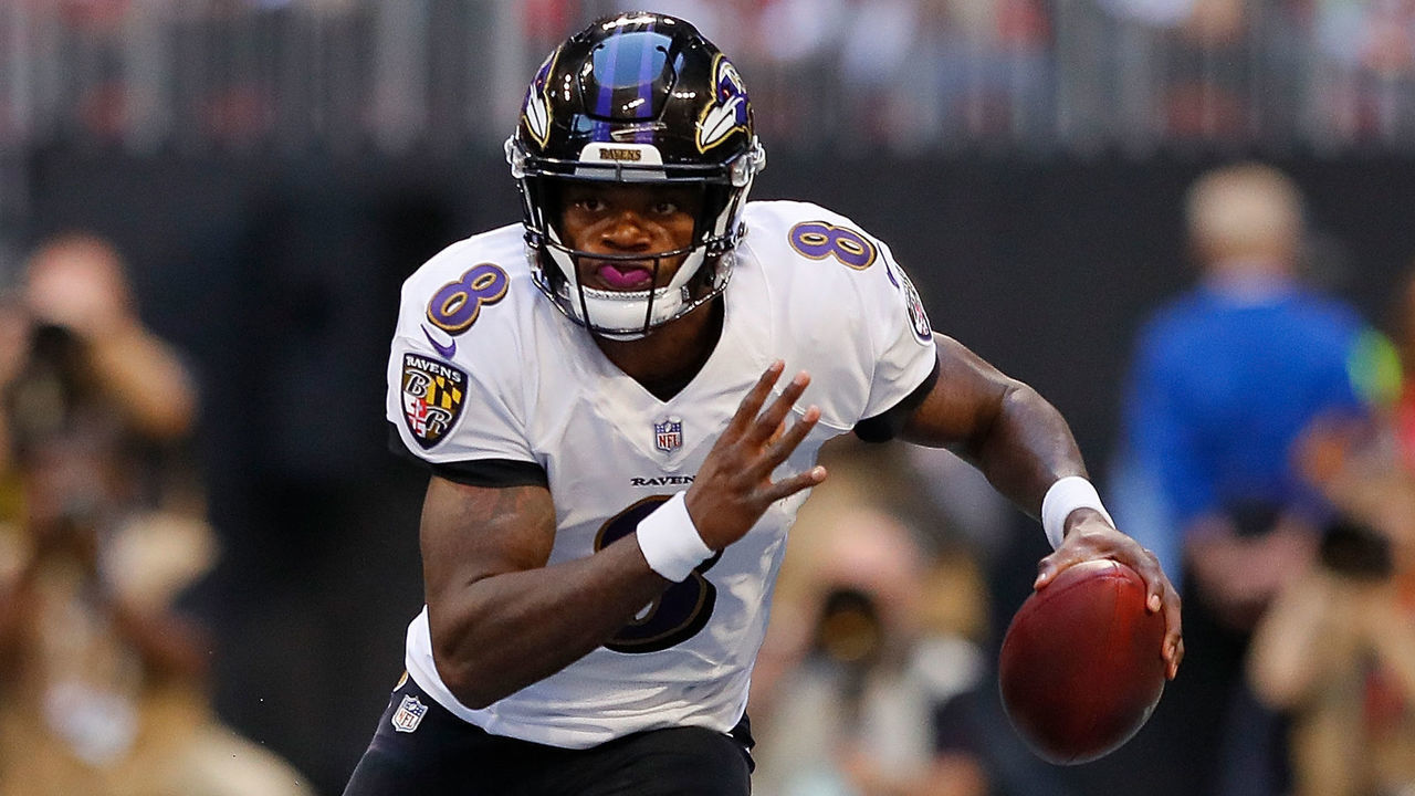 ATLANTA, GA - DECEMBER 02: Lamar Jackson #8 of the Baltimore Ravens rushes the ball against the Atlanta Falcons at Mercedes-Benz Stadium on December 2, 2018 in Atlanta, Georgia.