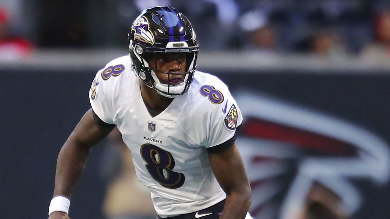 ATLANTA, GA - DECEMBER 02: Baltimore Ravens quarterback Lamar Jackson (8) rolls out to pass in an NFL football game between the Baltimore Ravens and Atlanta Falcons on December 2, 2018 at Mercedes-Benz Stadium.