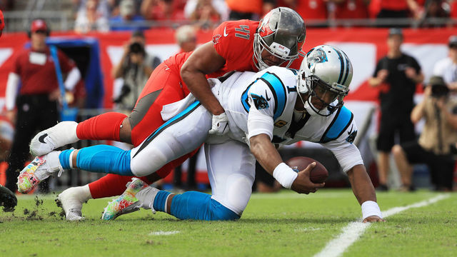 TAMPA, FLORIDA - DECEMBER 02: Cam Newton #1 of the Carolina Panthers gets sacked by Kevin Minter #41 of the Tampa Bay Buccaneers during the first quarter at Raymond James Stadium on December 02, 2018 in Tampa, Florida.