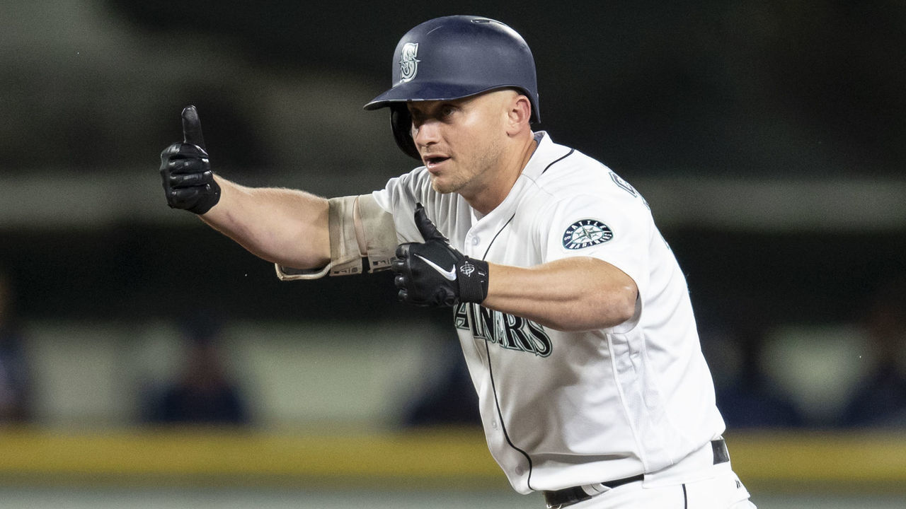 SEATTLE, WA - SEPTEMBER 29: Kyle Seager #15 of the Seattle Mariners reacts after hitting a double off of starting pitcher Adrian Sampson #52 of the Texas Rangers during the seventh inning of a game at Safeco Field on September 29, 2018 in Seattle, Washington. The Mariners won the game 4-1.