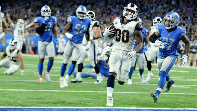 DETROIT, MI - DECEMBER 02: Todd Gurley #30 of the Los Angeles Rams runs for a touchdown against the Detroit Lions during the fourth quarter at Ford Field on December 2, 2018 in Detroit, Michigan.