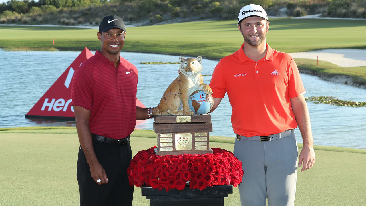 NASSAU, BAHAMAS - DECEMBER 02: Jon Rahm of Spain poses with the trophy and the tournament host Tiger Woods of the United States after his four shot win in the final round of the 2018 Hero World Challenge at Albany Bahamas on December 02, 2018 in Nassau, Bahamas.