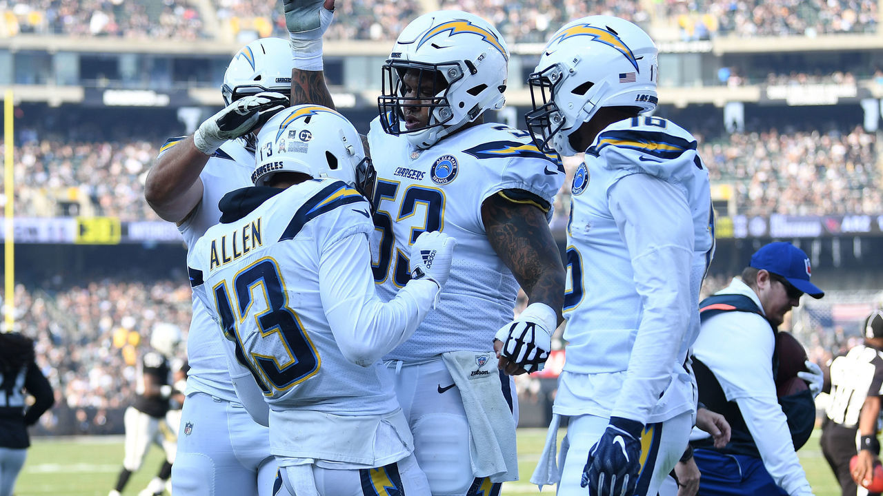 OAKLAND, CA - NOVEMBER 11: Keenan Allen #13 of the Los Angeles Chargers celebrates after an 11-yard touchdown against the Oakland Raiders during their NFL game at Oakland-Alameda County Coliseum on November 11, 2018 in Oakland, California.