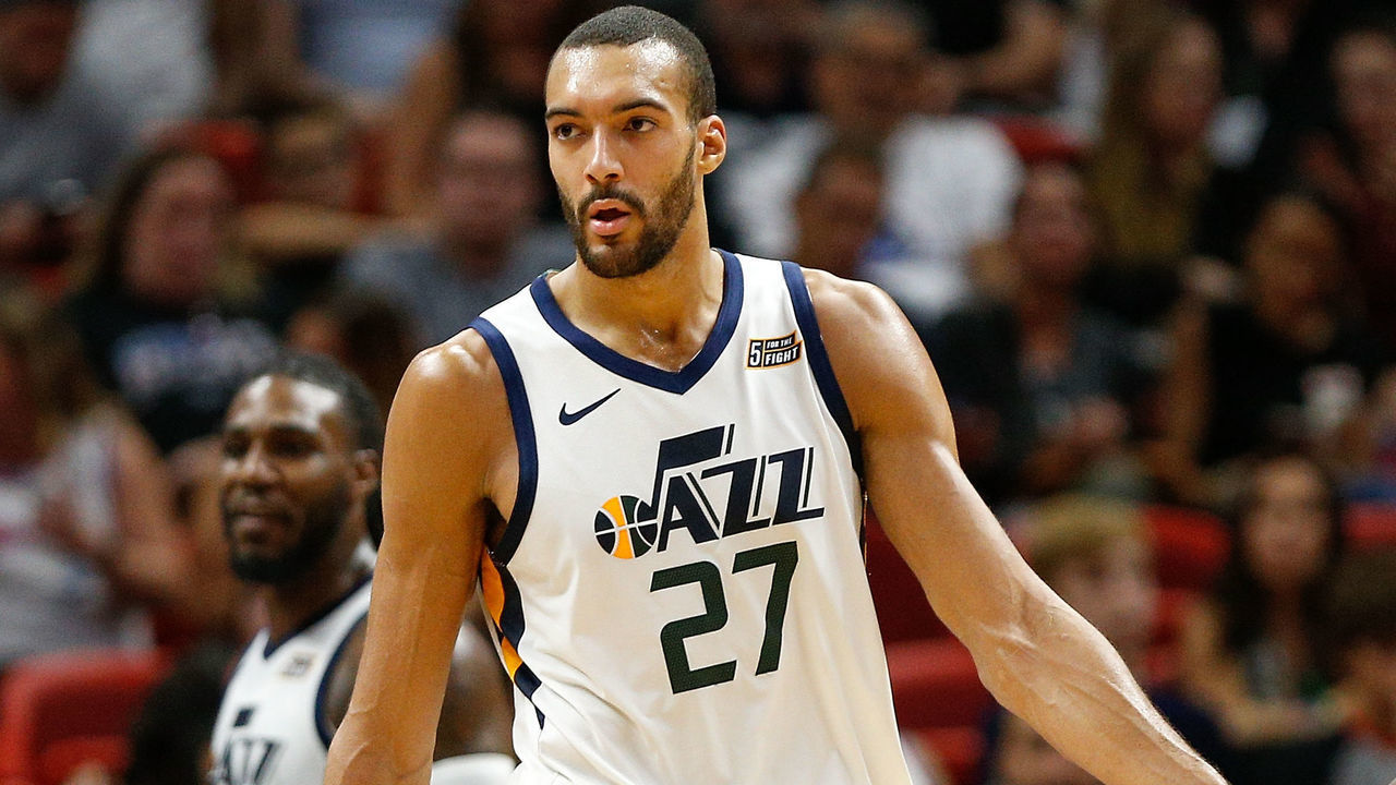 MIAMI, FL - DECEMBER 02: Rudy Gobert #27 of the Utah Jazz celebrates with Royce O'Neale #23 against the Miami Heat during the first half at American Airlines Arena on December 2, 2018 in Miami, Florida.