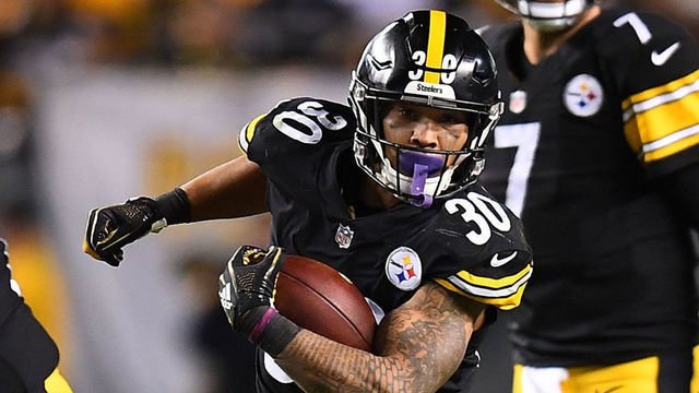 PITTSBURGH, PA - DECEMBER 02: James Conner #30 of the Pittsburgh Steelers rushes the ball in the first half during the game against the Los Angeles Chargers at Heinz Field on December 2, 2018 in Pittsburgh, Pennsylvania.