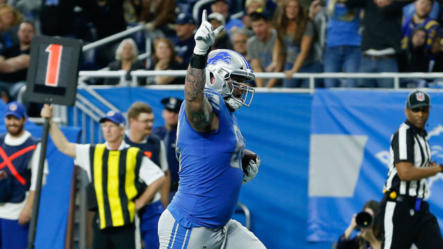 DETROIT, MI - DECEMBER 02: Detroit Lions tackle Taylor Decker (68) runs into the end zone for a touchdown after catching a pass during a regular season game between the Los Angeles Rams and the Detroit Lions on December 2, 2018 at Ford Field in Detroit, Michigan. Los Angeles defeated Detroit 30-16.