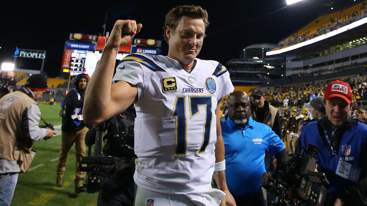PITTSBURGH, PA - DECEMBER 02: Philip Rivers #17 of the Los Angeles Chargers reacts as he runs off the field following a 33-30 win over the Pittsburgh Steelers at Heinz Field on December 2, 2018 in Pittsburgh, Pennsylvania.