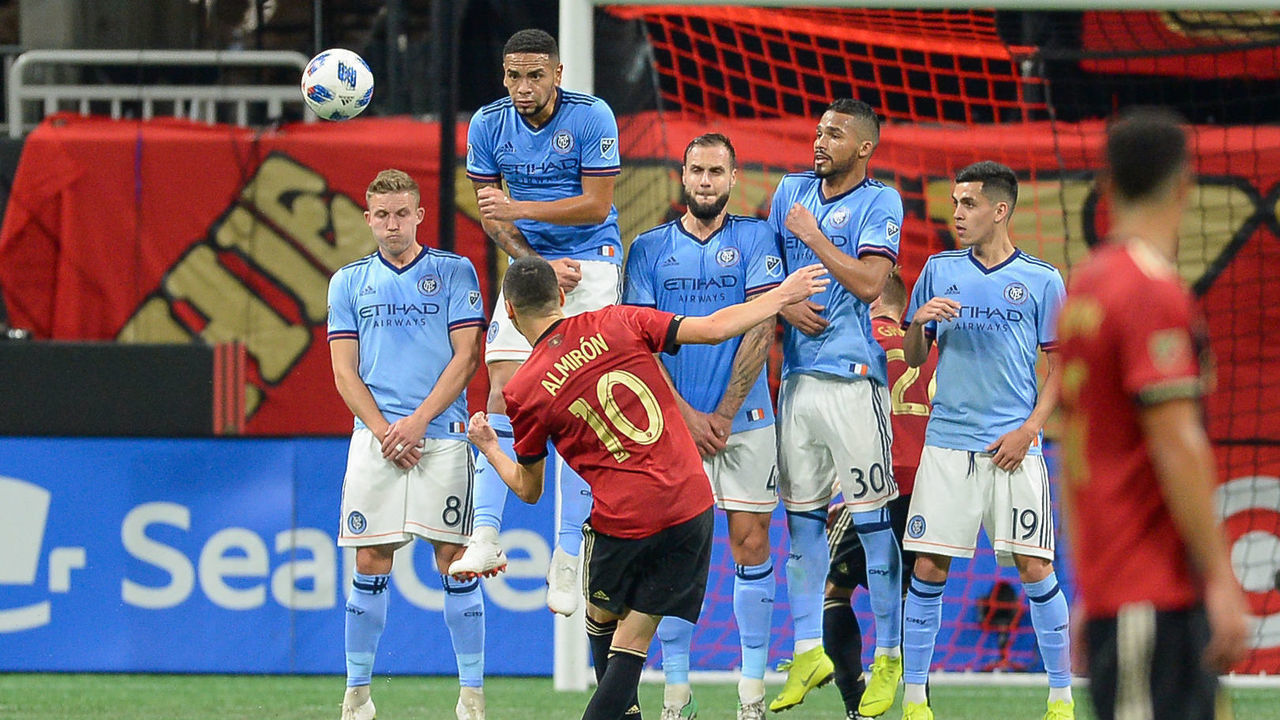 ATLANTA, GA NOVEMBER 11: Atlanta's Miguel Almiron (10) bends a free kick around the NYCFC wall to score a goal during the MLS Eastern Conference semifinal match between Atlanta United and NYCFC on November 11th, 2018 at Mercedes-Benz Stadium in Atlanta, GA. Atlanta United FC defeated New York City FC by a score of 3 to 1 to advance in the playoffs.