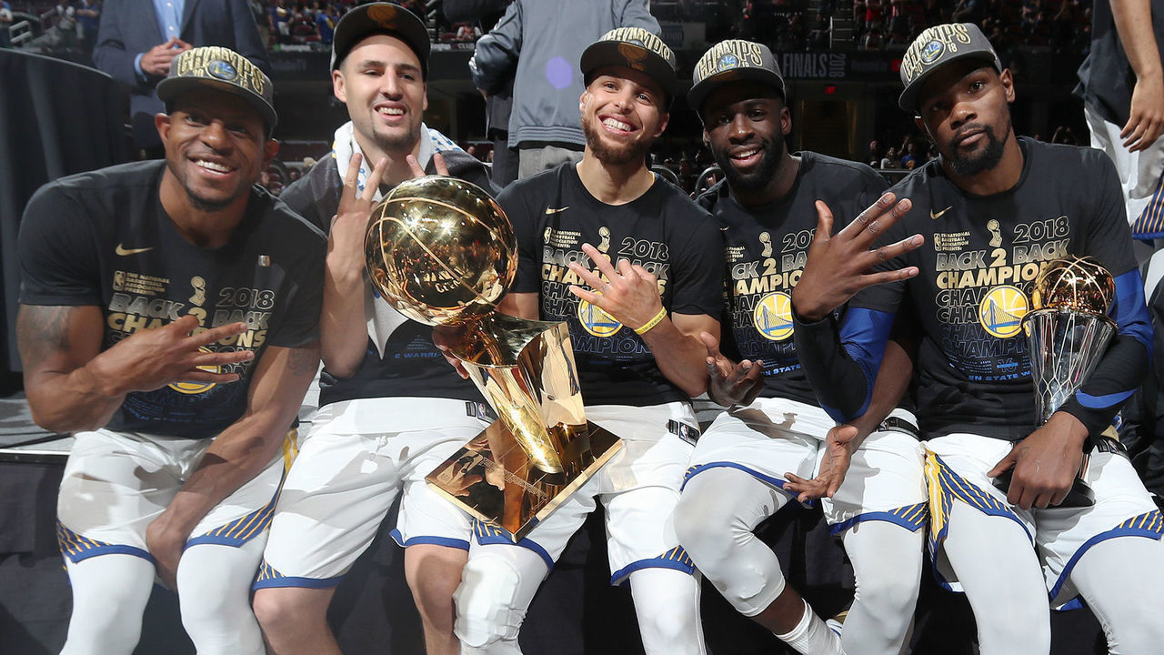 CLEVELAND, OH - JUNE 8: Andre Iguodala #9, Klay Thompson #11, Stephen Curry #30, Draymond Green #23, and Kevin Durant #35 of the Golden State Warriors pose with the Larry O'Brien Championship Trophy after Game Four of the 2018 NBA Finals against the Cleveland Cavaliers on June 8, 2018 at Quicken Loans Arena in Cleveland, Ohio. NOTE TO USER: User expressly acknowledges and agrees that, by downloading and/or using this photograph, user is consenting to the terms and conditions of the Getty Images License Agreement. Mandatory Copyright Notice: Copyright 2018 NBAE