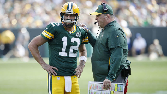 GREEN BAY, WI - SEPTEMBER 16: Head coach Mike McCarthy of the Green Bay Packers talks with Aaron Rodgers #12 during the game against the Minnesota Vikings at Lambeau Field on September 16, 2018 in Green Bay, Wisconsin. The game ended in a 29-29 tie.