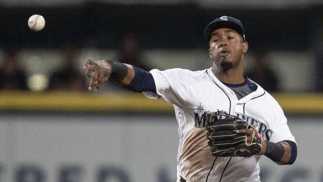 SEATTLE, WA - SEPTEMBER 5: Shortstop Jean Segura #2 of the Seattle Mariners throws to first base after fielding a ground ball during a game against the Baltimore Orioles at Safeco Field on September 5, 2018 in Seattle, Washington. The Mariners game 5-2.