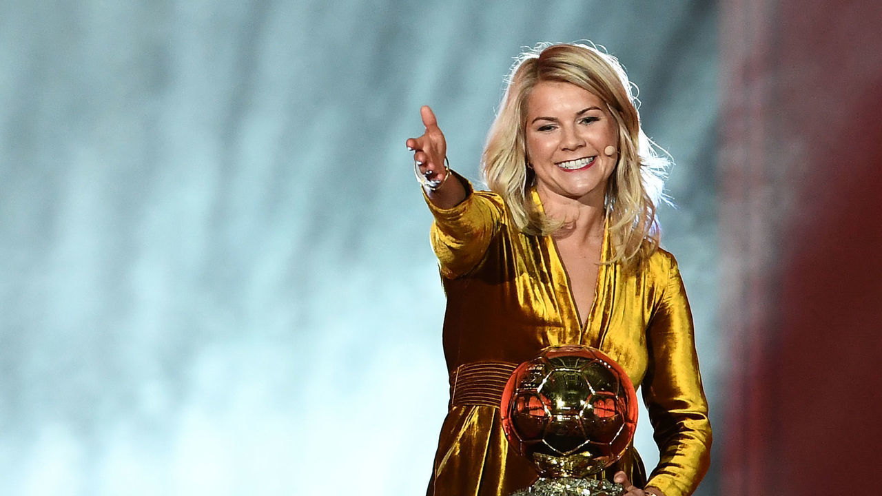Olympique Lyonnais' Norwegian forward Ada Hegerberg gestures after receiving the 2018 FIFA Women's Ballon d'Or award for best player of the year during the 2018 FIFA Ballon d'Or award ceremony at the Grand Palais in Paris on December 3, 2018. - The winner of the 2018 Ballon d'Or will be revealed at a glittering ceremony in Paris on December 3 evening, with Croatia's Luka Modric and a host of French World Cup winners all hoping to finally end the 10-year duopoly of Cristiano Ronaldo and Lionel Messi.