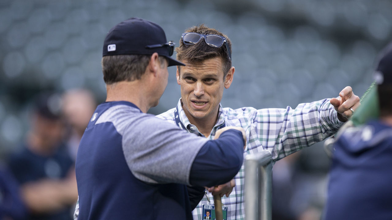SEATTLE, WA - MAY 3: Seattle Mariners general manager Jerry Dipoto (R) talks with manager Scott Servais before a game between the Oakland Athletics and the Seattle Mariners at Safeco Field on May 3, 2018 in Seattle, Washington. The Mariners won the game 4-1.