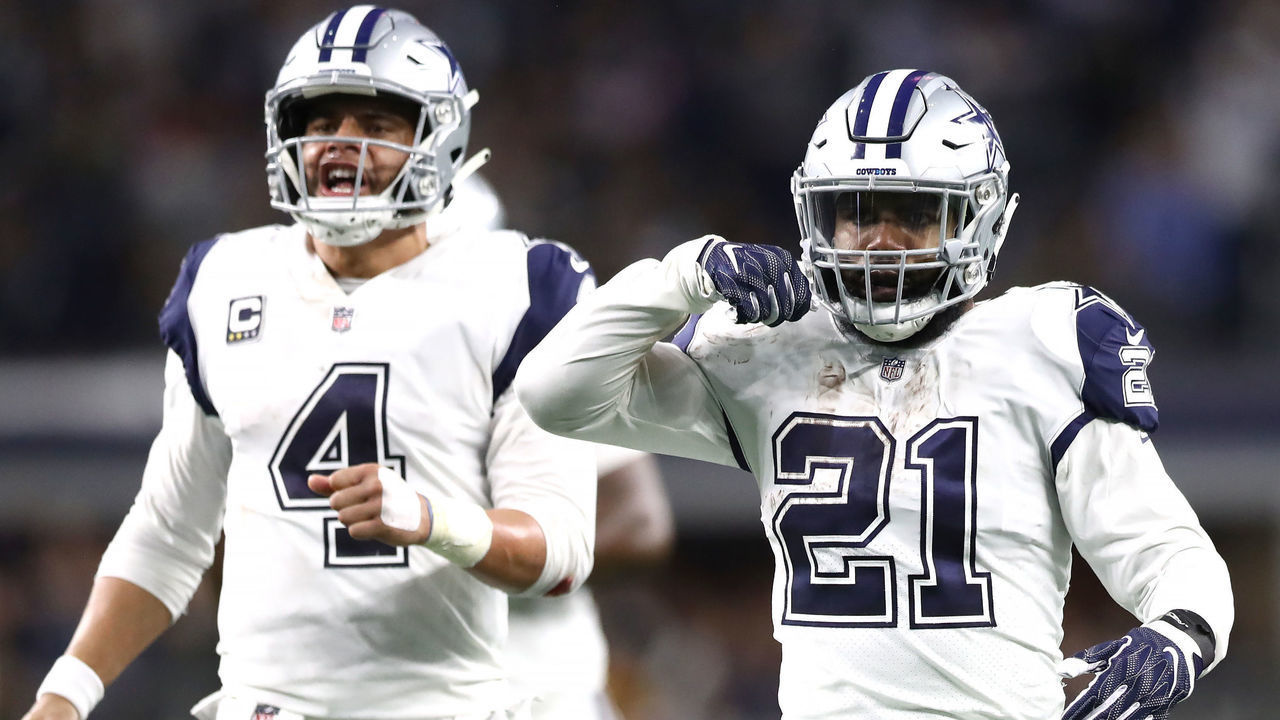 ARLINGTON, TEXAS - NOVEMBER 29: Ezekiel Elliott #21 of the Dallas Cowboys reacts after running for a first down with Dak Prescott #4 in the fourth quarter against the New Orleans Saints at AT&T Stadium on November 29, 2018 in Arlington, Texas.